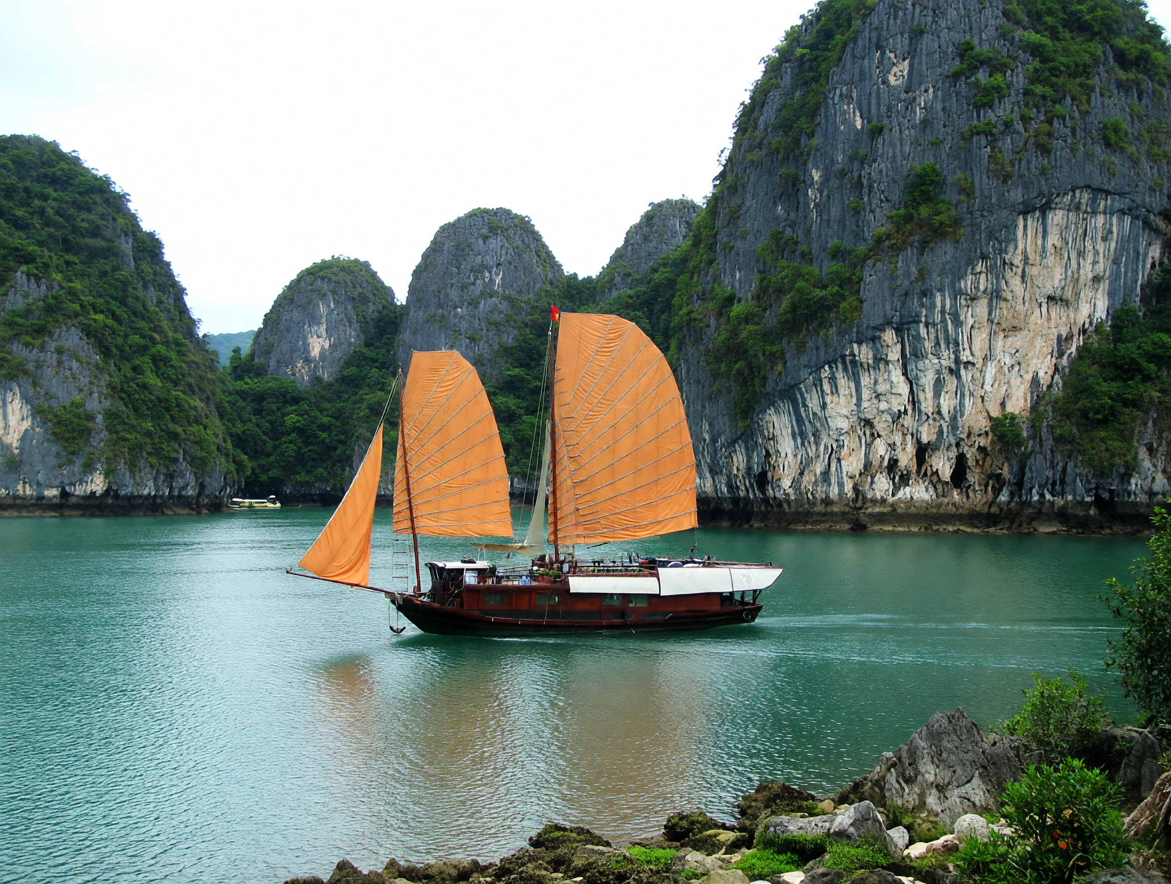 Cat Ba island beaches and limestone cliffs in Ha Long Bay Vietnam